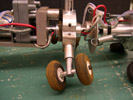 Closeup of complete robot, showing dirty wheels